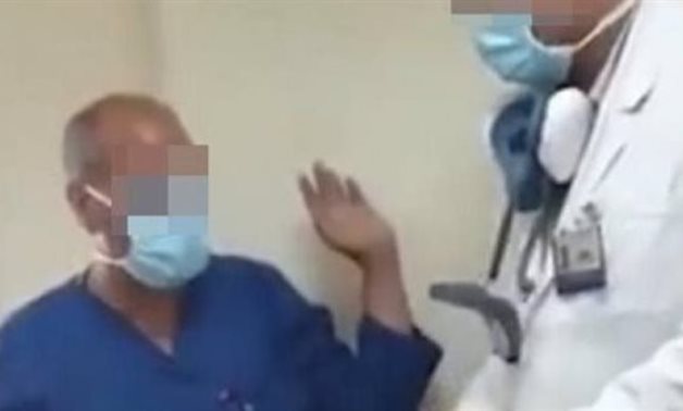 Photo courtesy of the video that went viral on social media for a doctor insulting a male nurse for his dog