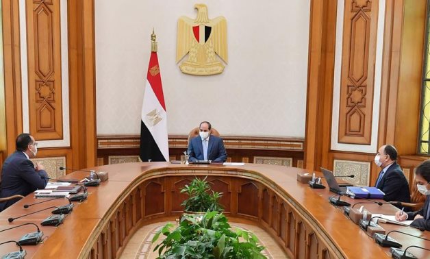Egyptian President Abdel Fattah El Sisi meets with Prime Minister Mostafa Madbouli and Finance Minister Mohamed Mait - Egyptian Presidency