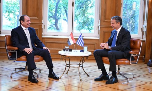 President Abdel Fatah al-Sisi and Greek Prime Minister Kyriakos Mitsotakis on the sidelines of the 9th Tripartite Summit in Athens on October 19, 2021. Press Photo
