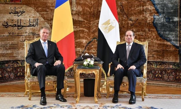 President Abdel Fatah al-Sisi and Romanian counterpart Klaus Iohannis in Cairo's Al Itihadiyah presidential palace on October 27, 2021. TV screenshot