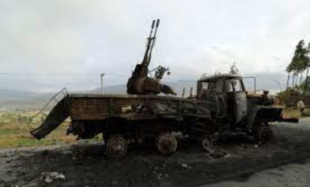 FILE - A machine gun mounted in a burnt-out truck on the road to Abiy Addi town in Ethiopia due to fighting between Ethiopian Army and Tigray Forces, July 10, 2021. REUTERS/Giulia Paravicini