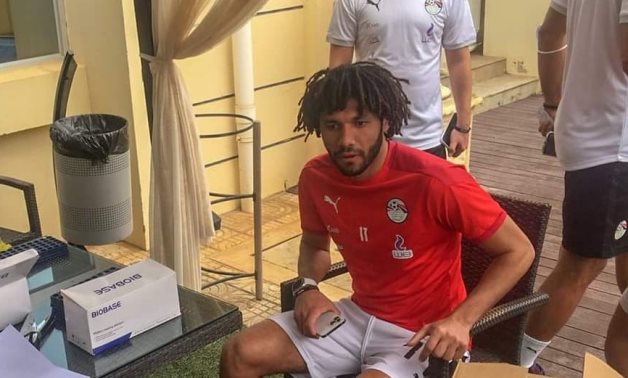 File - Egypt's midfielder Mohamed Elneny undergoes the COVID-19 test in Luanda