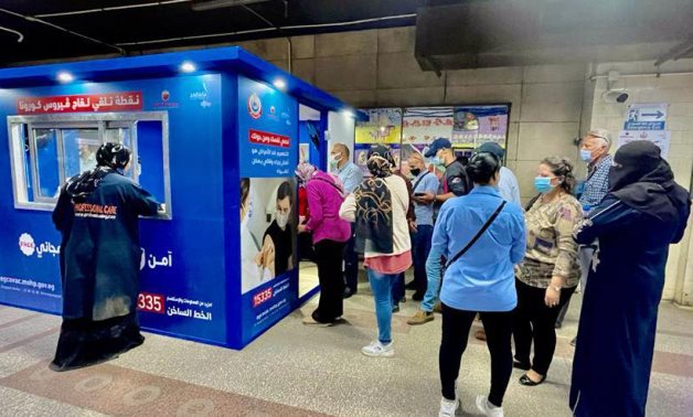 Citizens receiving Covid-19 vaccine at a kiosk in a metro station in Cairo - press photo