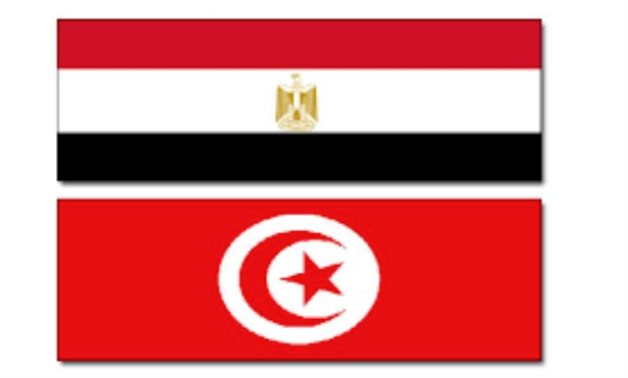 FILE - Flags of Egypt & Tunisia