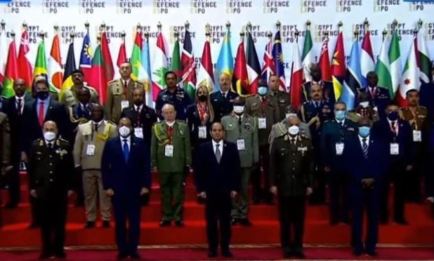 President Abdel Fatah Al-Sisi posing with defense ministers and chief commanders of foreign armed forces attending the opening of EDEX 2021 in Cairo on November 29. TV screenshot
