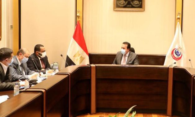 Egyptian Acting Health Minister Khaled Abdel-Ghaffar meets with Health officials on Saturday, December 4, 2021- press photo