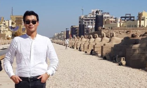 South Korean ambassador to Egypt Hong Jin-wook poses for a photo in the newly-reopened Avenue of Sphinxes- photo courtesy of his official Twitter account.