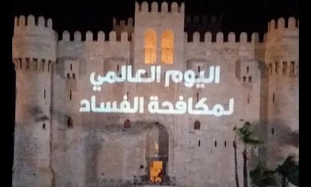 Citadel of Qaitbay in Alexandria lit up with the anti-corruption slogan - Min. of Tourism & Antiquities