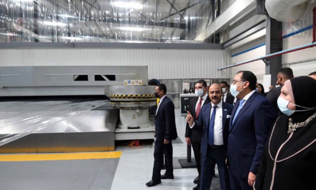 Prime Minister Mostafa Madbouli in the inauguration of the first production line of high barrier films in 6th of October City on December 20, 2021. Egypt Today/Suleiman Al Atify