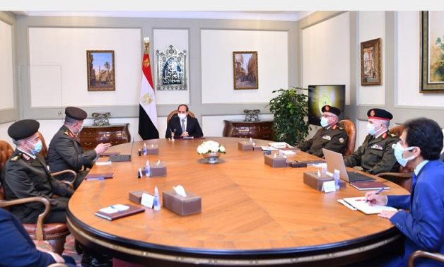 President Abdel Fattah El Sisi meets with ministers on December 23, 2021- press photo