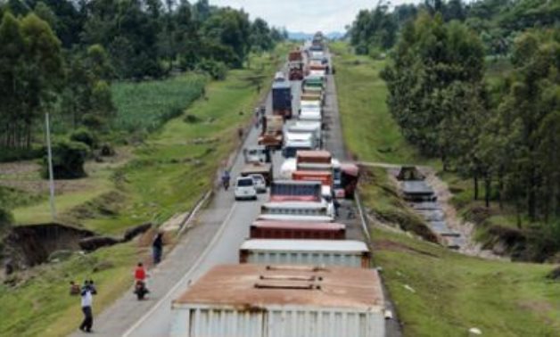 Truck drivers wait near Busia to test for COVID-19 before entering Uganda - WTO 