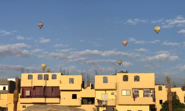 Hot air balloons flying in Luxor's skies 