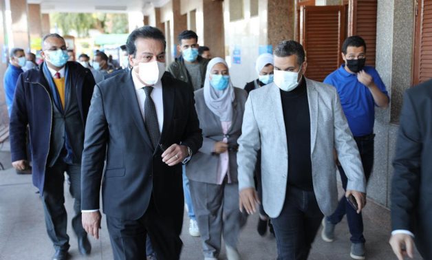 Acting Health Minister Khaled Abdel Ghaffar inspects on Saturday the Aswan railway station center designated for coronavirus vaccination - Health Ministry