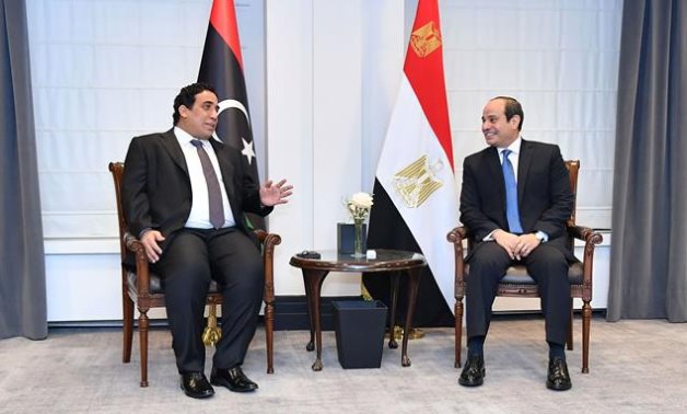 President Abdel Fattah El-Sisi met with the head of the Libyan Presidential Council, Mohamed Al-Manfi, in Brussels, Belgium- press photo