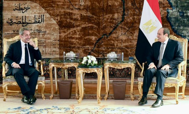 President Abdel Fatah al-Sisi and former French President Nicolas Sarkozy in Cairo, Egypt on February 21, 2022. Press Photo