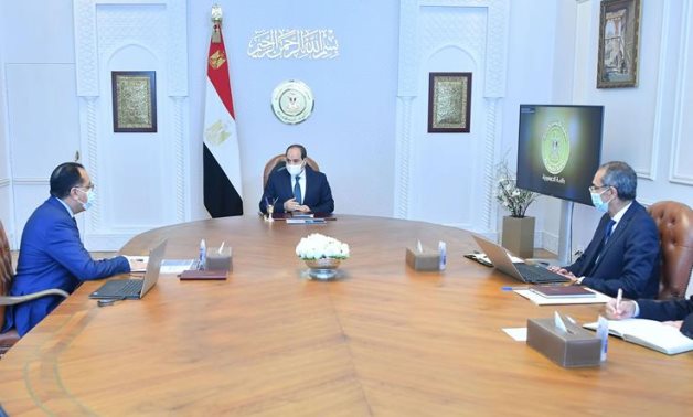 President Abdel Fattah El Sisi meets with Egyptian Prime Minister Mustafa Mabdouli and Minister of Communication and Information Technology Amr Talaat on Monday, March 7, 2022- press photo