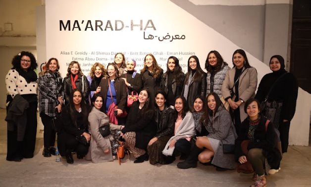File: Nadine Abdel Ghaffar and the female artists participating in the exhibition.