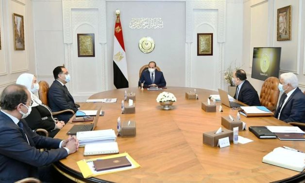 President Abdel Fatah al-Sisi in meeting with the prime minister, and finance minister among other senior officials on March 20, 2022. Press Photo