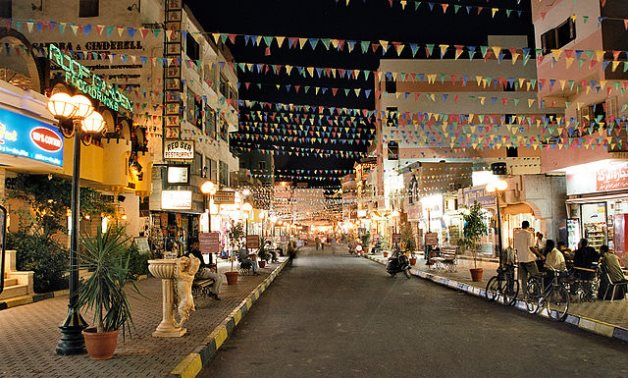 A night view of the main street of the bazaar in El Dahar during the month of Ramadan, Hurghada, Egypt - Wikimedia Commons/Przemyslaw "Blueshade" Idzkiewicz.