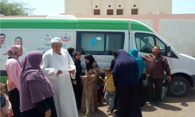 FILE – Mobile clinic operating within a medical caravan in Egyptian rural village