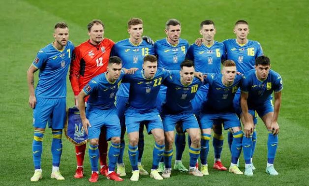 Ukraine players pose for a team group photo before the match REUTERS/Gleb Garanich