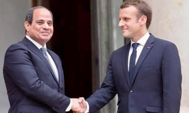 FILE - President Abdel Fatah al-Sisi and French counterpart Emmanuel Macron 