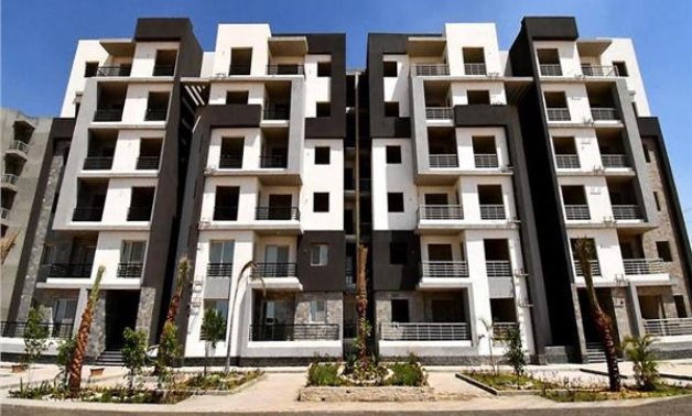 FILE – Flat-buildings at Dar Misr residential compound developed by the government for high-middle-income citizens 
