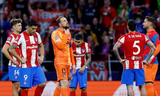 Atletico Madrid's Jan Oblak looks dejected after the match with teammates REUTERS/Juan Medina