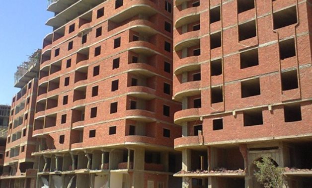 FILE - Unlicensed building – Al Ahram 