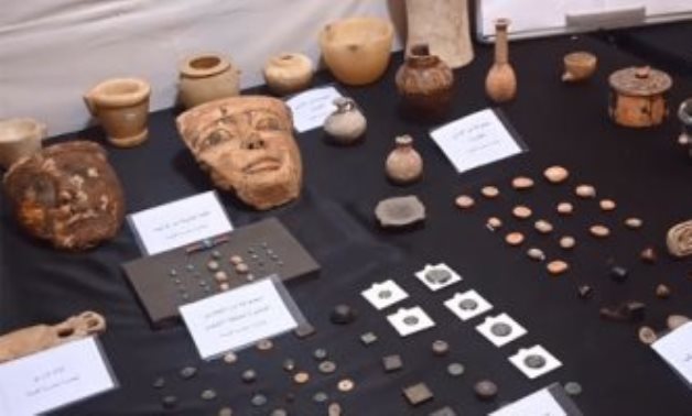 FILE – Part of the artifacts confiscated at the Zamalek apartment  
