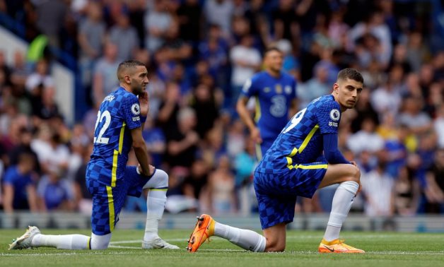 Chelsea's Hakim Ziyech and Chelsea's Kai Havertz take a knee before the match Action Images via Reuters/Andrew Couldridge