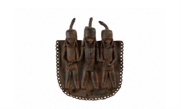 A square bronze pendant or ornament, one of the objects that London's Horniman Museum says was looted from Benin City by British soldiers in 1897. Horniman Museum and Gardens/Handout via REUTERS