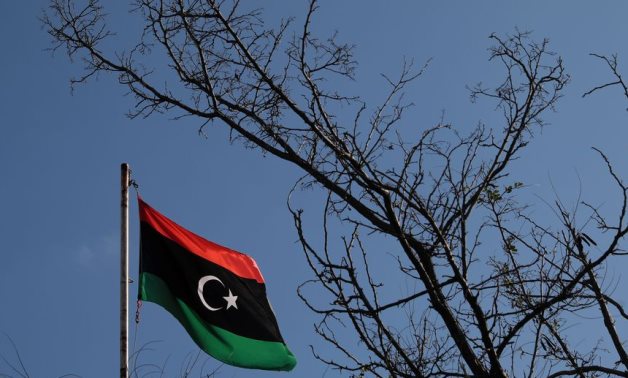 A Libyan flag flutters atop the Libyan Consulate in Athens, Greece, December 6, 2019. REUTERS/Costas Baltas