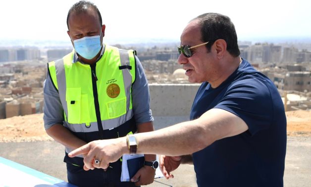 President Abdel Fattah El-Sisi inspected the construction work of a number of ongoing development projects of the roads and bridges infrastructure in Greater Cairo-press photo