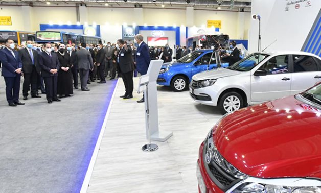 FILE - Egyptian President Abdel Fattah El-Sisi inspects the country's exhibition for technologies of converting vehicles to run on natural gas - Presidency