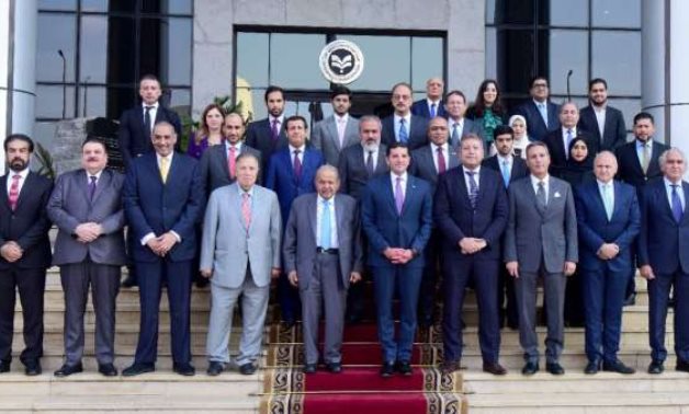 Group photo of Qatari business delegation and GAFI chairman in Cairo, Egypt in October 2022. Press Photo