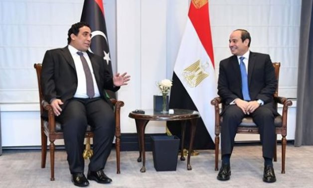 President Abdel Fattah El-Sisi met with the head of the Libyan Presidential Council, Mohamed Al-Manfi, in Brussels, Belgium- press photo