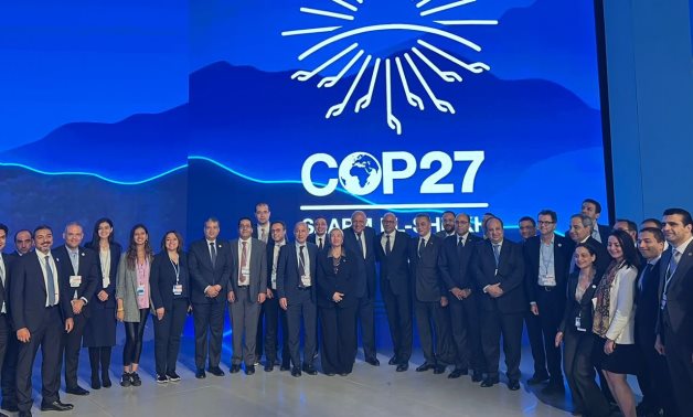 COP27 President Sameh Shoukry and climate change negotiators pose for a picture at the end of the conference in Sharm El Sheikh- press photo