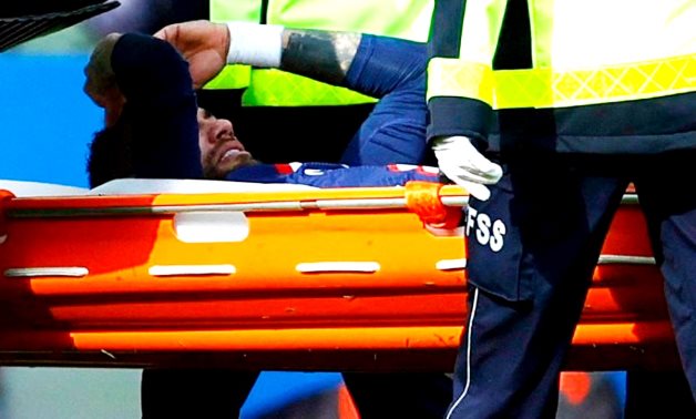 Paris St Germain's Neymar is stretchered off after sustaining an injury REUTERS/Sarah Meyssonnier