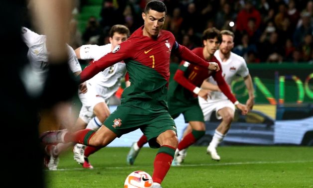 Portugal's Cristiano Ronaldo scores their third goal from the penalty spot REUTERS/Pedro Nune