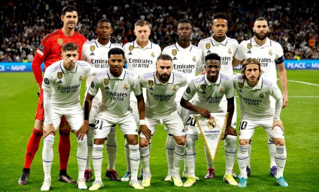 Real Madrid players pose for a team group photo before the match REUTERS/Albert Gea