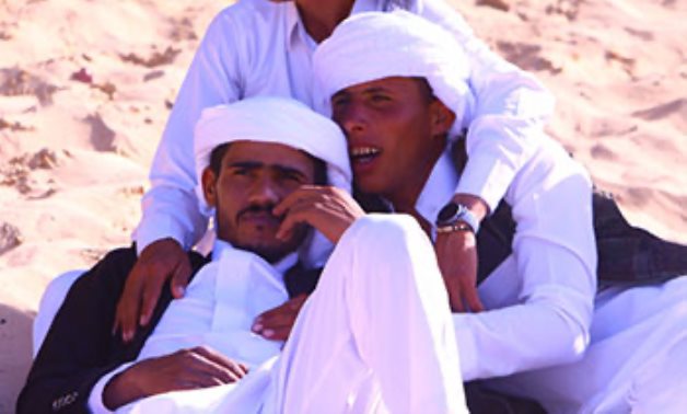 Bedouins watching celebrations - Hussein Tallal