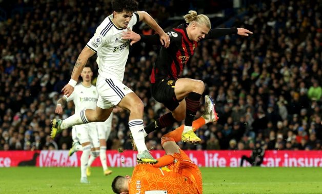 Leeds United's Pascal Struijk and Illan Meslier in action with Manchester City's Erling Braut Haaland Action Images via Reuters/Lee Smith