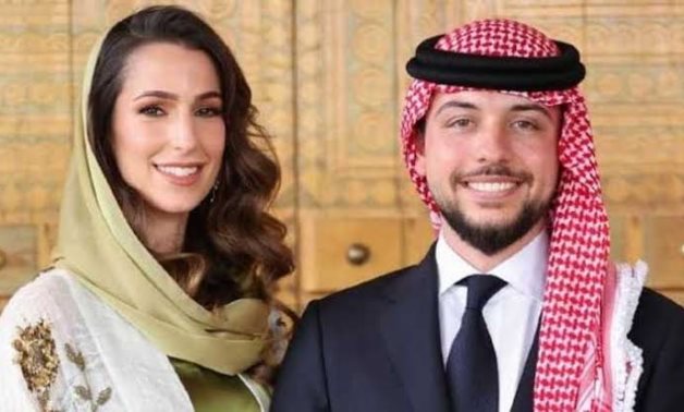 File: Jordan’s Crown Prince Hussein bin Abdullah II and his wife Saudi architect Rajwa Al Saif.