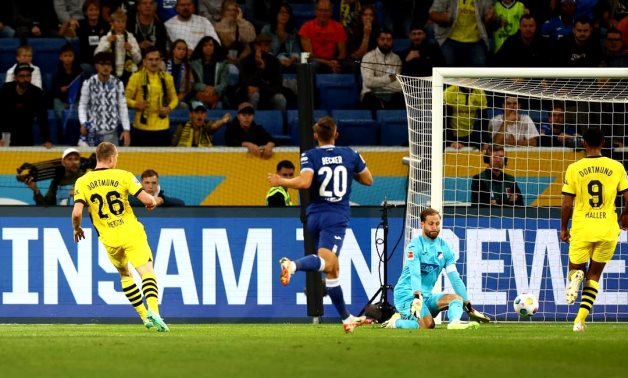 Borussia Dortmund's Julian Ryerson scores their third goal REUTERS/Kai Pfaffenbach