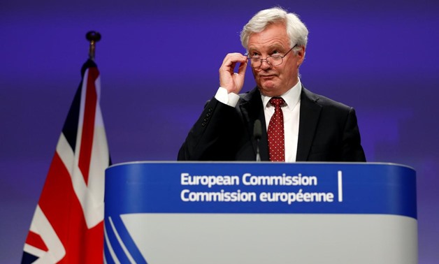 FILE PHOTO: Britain's Secretary of State for Exiting the European Union David Davis holds a joint news conference with European Union's chief Brexit negotiator Michel Barnier (unseen) marking the end of the third formal negotiation session in Brussels, Be