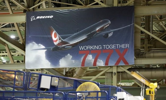 A 777X banner is pictured above the 777 Wing Horizontal Build Line at Boeing's production facility in Everett, Washington- REUTERS-Jason Redmond