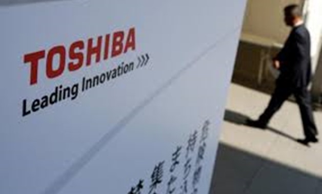 FILE PHOTO: The logo of Toshiba is seen as a shareholder arrives at Toshiba's extraordinary shareholders meeting in Chiba, Japan March 30, 2017. REUTERS/Toru Hanai/File Photo

