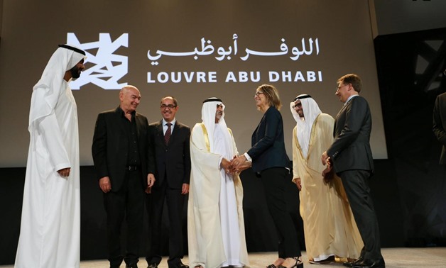 Sheikh Nahyan bin Mubarak, UAE Minister of Culture, shakes hands with Francoise Nyssen, French Minister of Culture, after announcing the opening date of Louvre Abu Dhabi in Abu Dhabi, United Arab Emirates September 6, 2017. REUTERS/Stringer