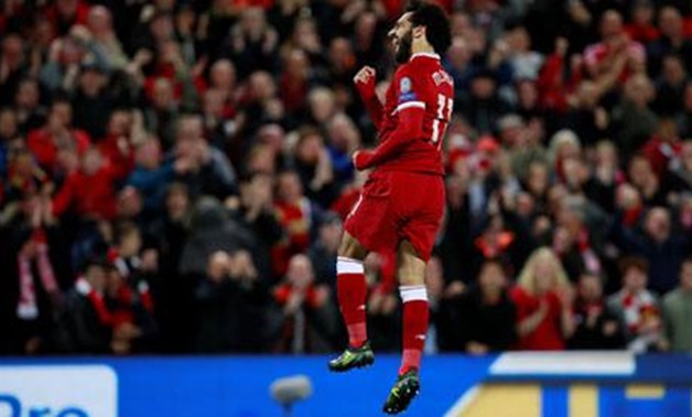 Mohamed Salah celebrating his goal against Sevilla, REUTERS